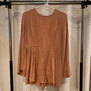 Rose colored linen long sleeve romper